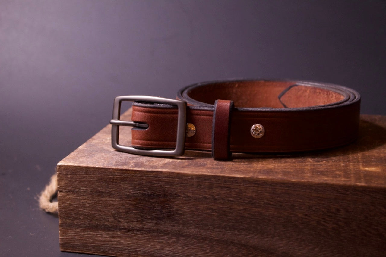 The Sharp Dressed Man mens leather belt, brown, front right view rolled