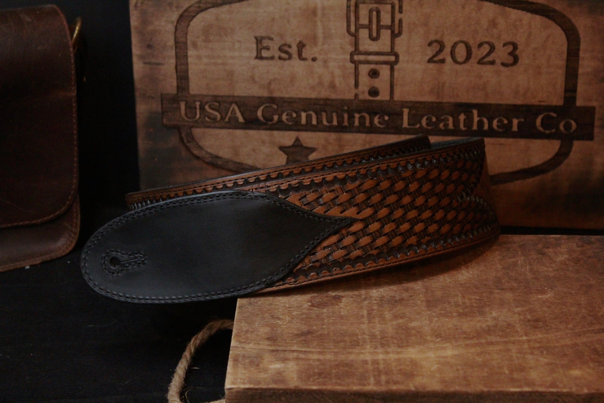 Custom Hand Tooled Leather Guitar Strap, front view bottom rolled