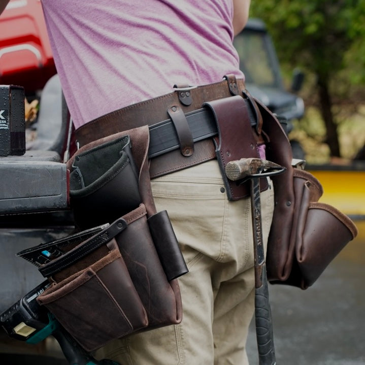 brown leather tool belt, back view on person